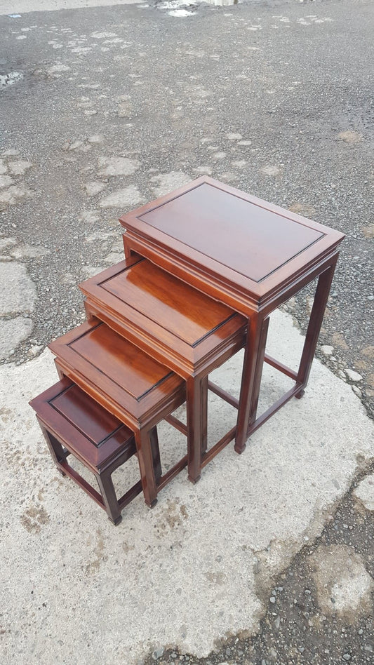 Nest of Four Rosewood Tables